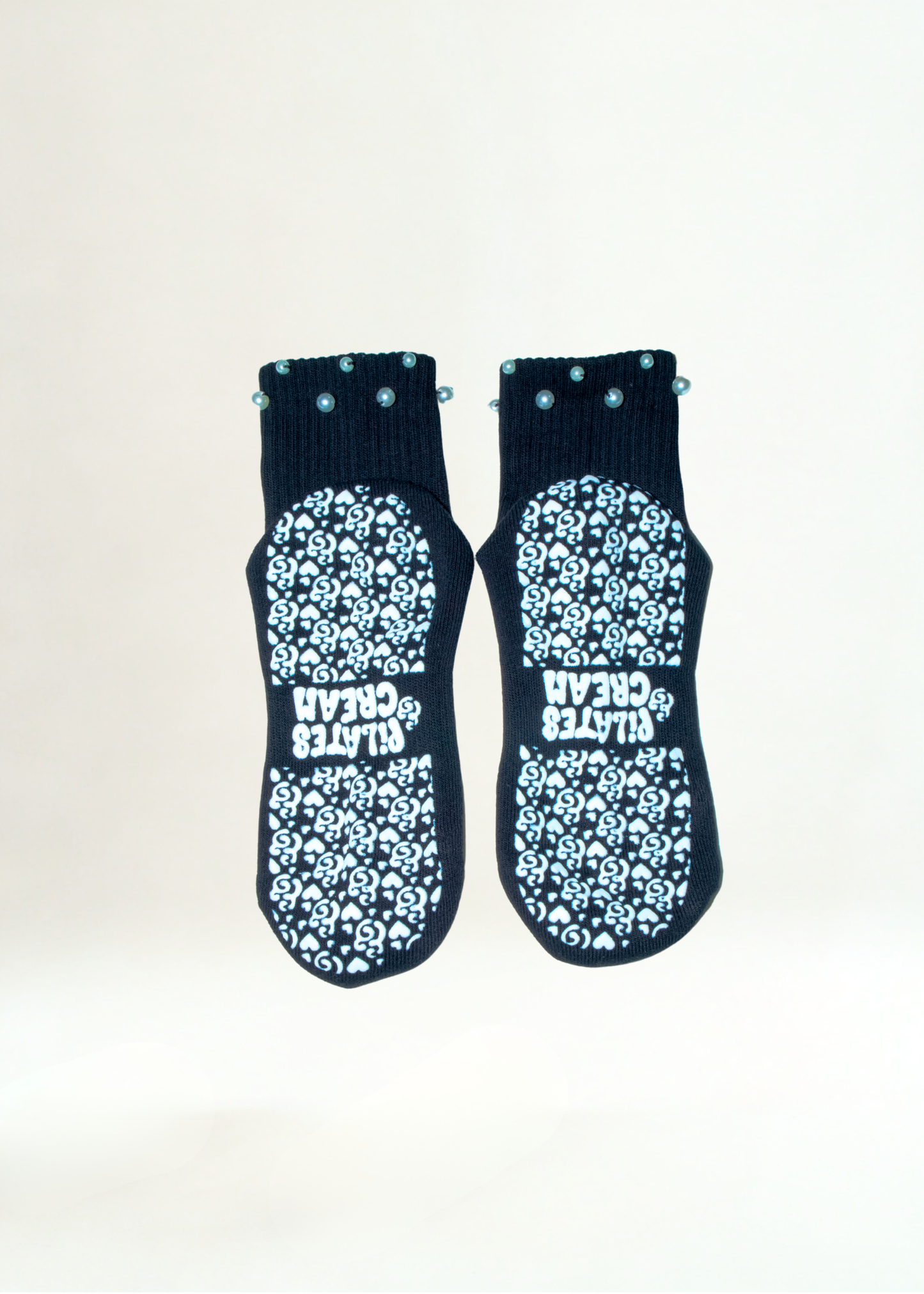 The Marilyn pearl Pilates grip socks — close-up detail by Pilates & Cream