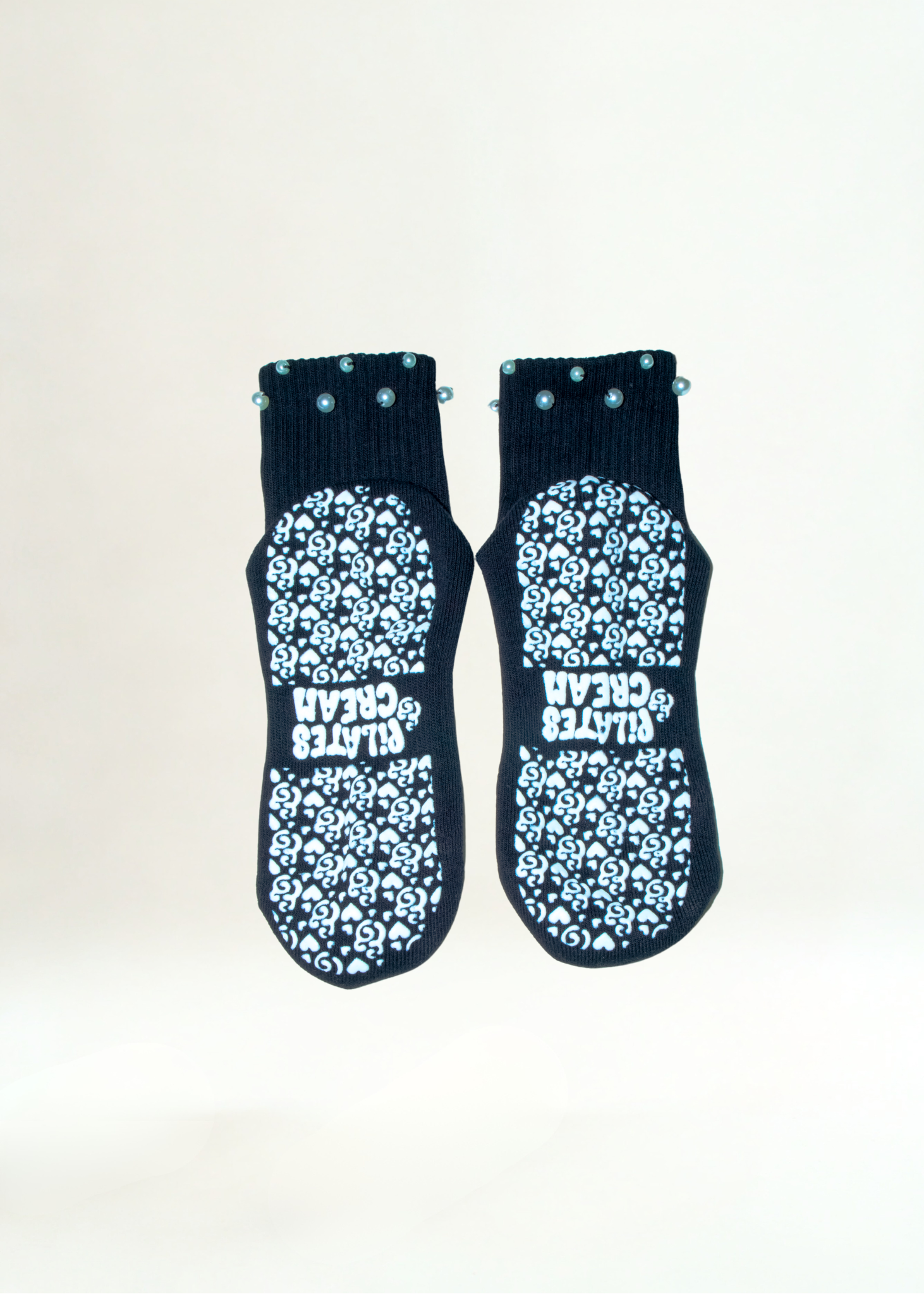 The Marilyn pearl Pilates grip socks — close-up detail by Pilates & Cream