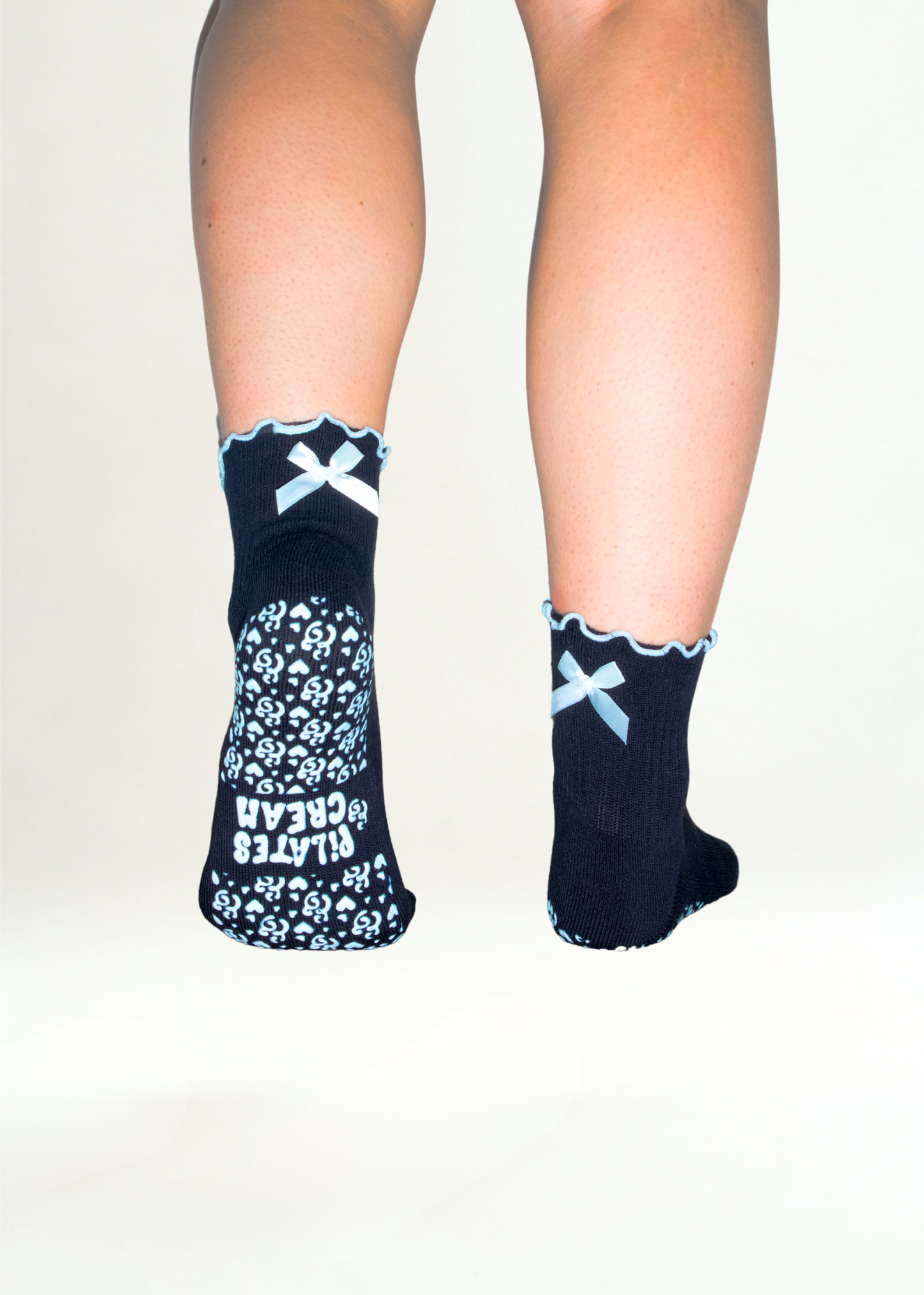 The Hailey minimal Pilates grip socks — styled flatlay by Pilates & Cream